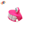 Giocattoli divertenti dei denti di plastica del versamento dei giocattoli dei denti
